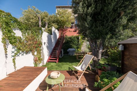 Appartement de type loft avec terrasse et jardin