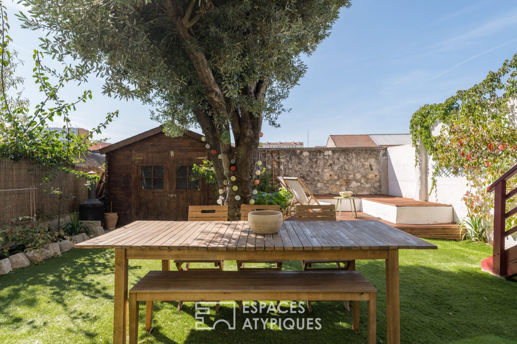 Appartement de type loft avec terrasse et jardin