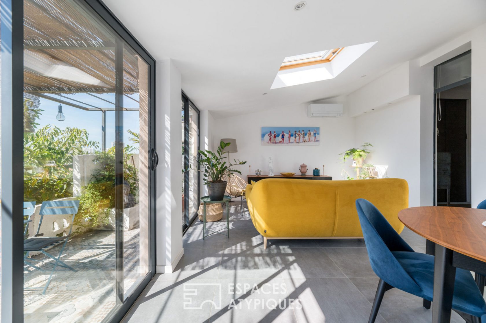 Appartement de type loft avec terrasse et jardin