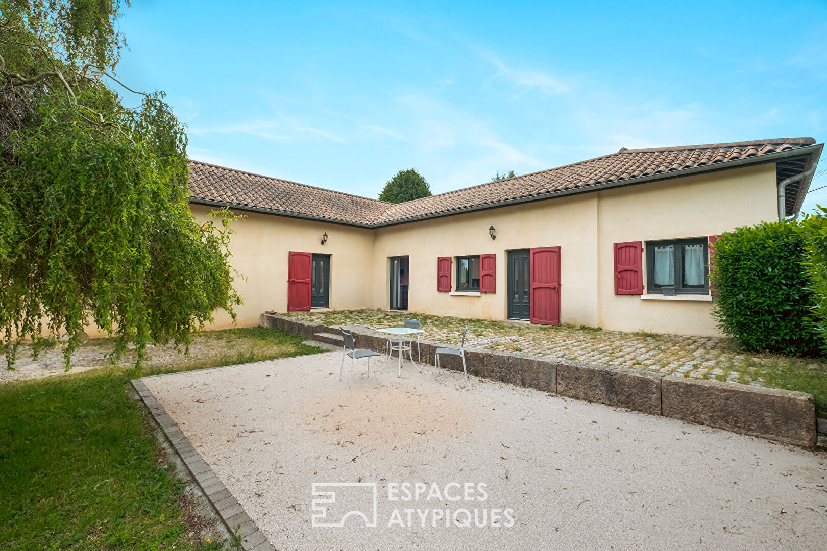 Old renovated farmhouse in a park