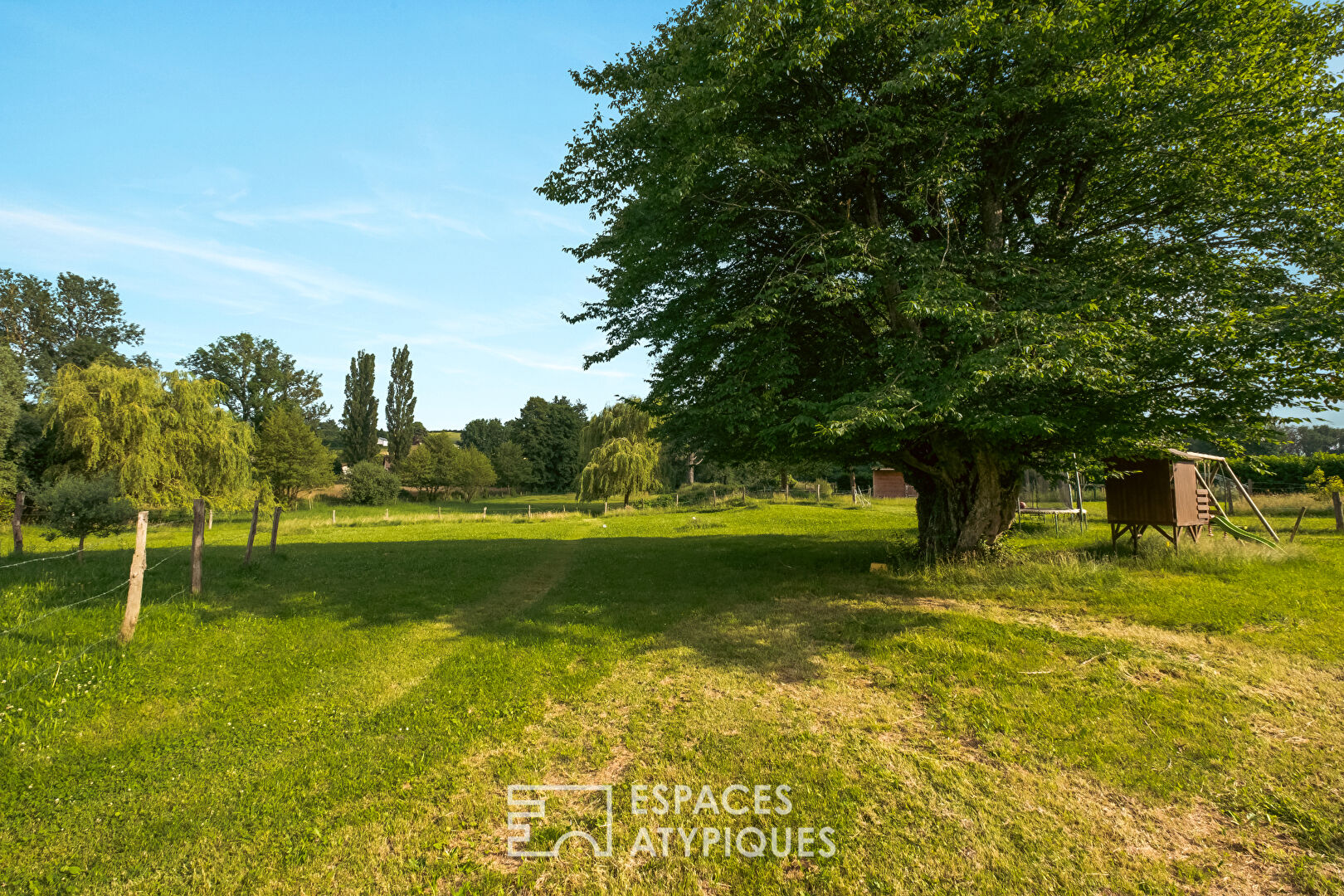 Old renovated farmhouse in a park