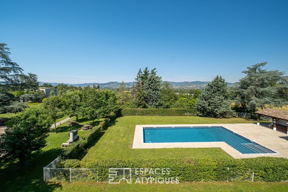 Appartement en dernier étage avec terrasse et vue sur les monts du Lyonnais