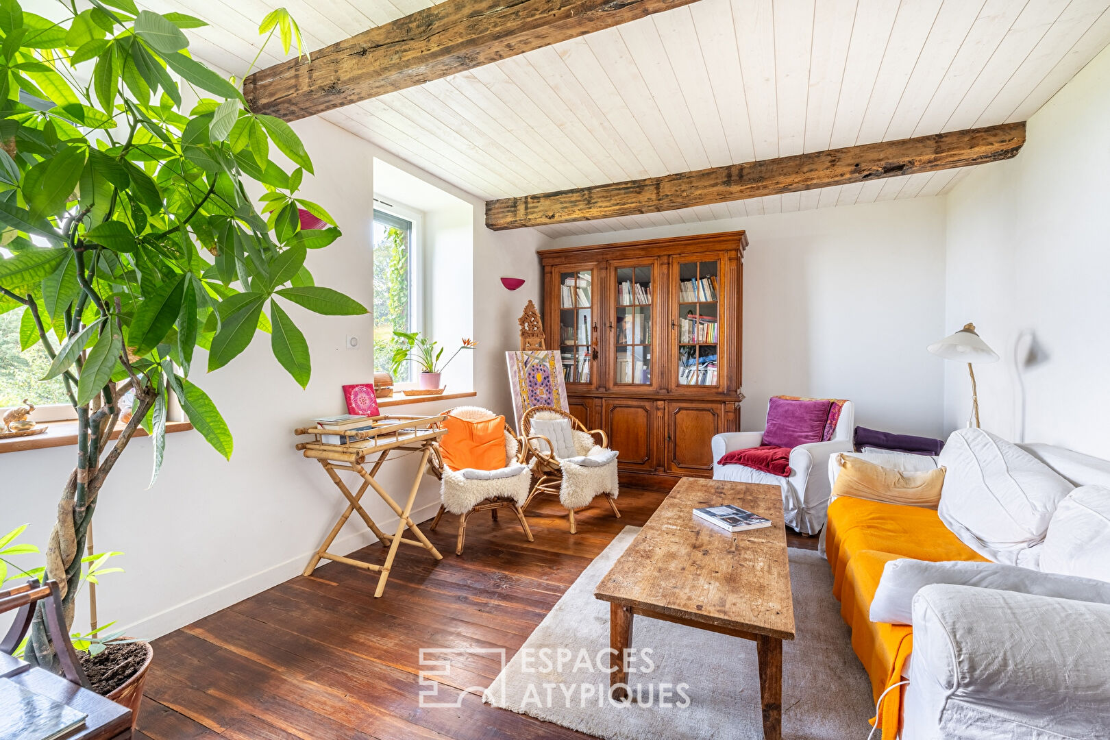 Old renovated farmhouse with outbuildings