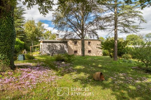 Maison des années 70 à fort potentiel dans un cadre unique