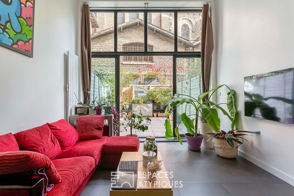 Loft avec terrasse dans un ancien atelier