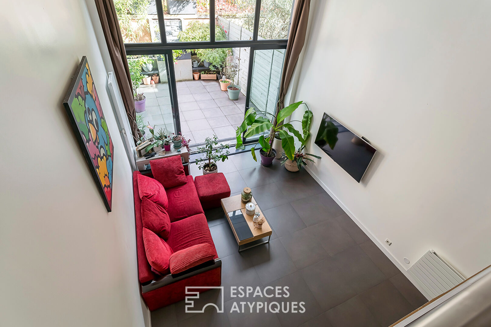 Loft with terrace in a former workshop