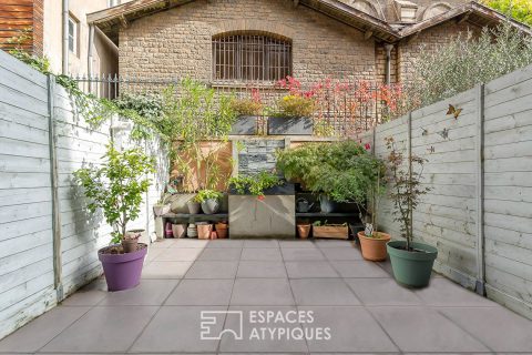 Loft avec terrasse dans un ancien atelier