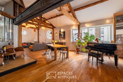 Appartement ancien rénové type loft en dernier étage