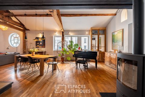 Appartement ancien rénové type loft en dernier étage