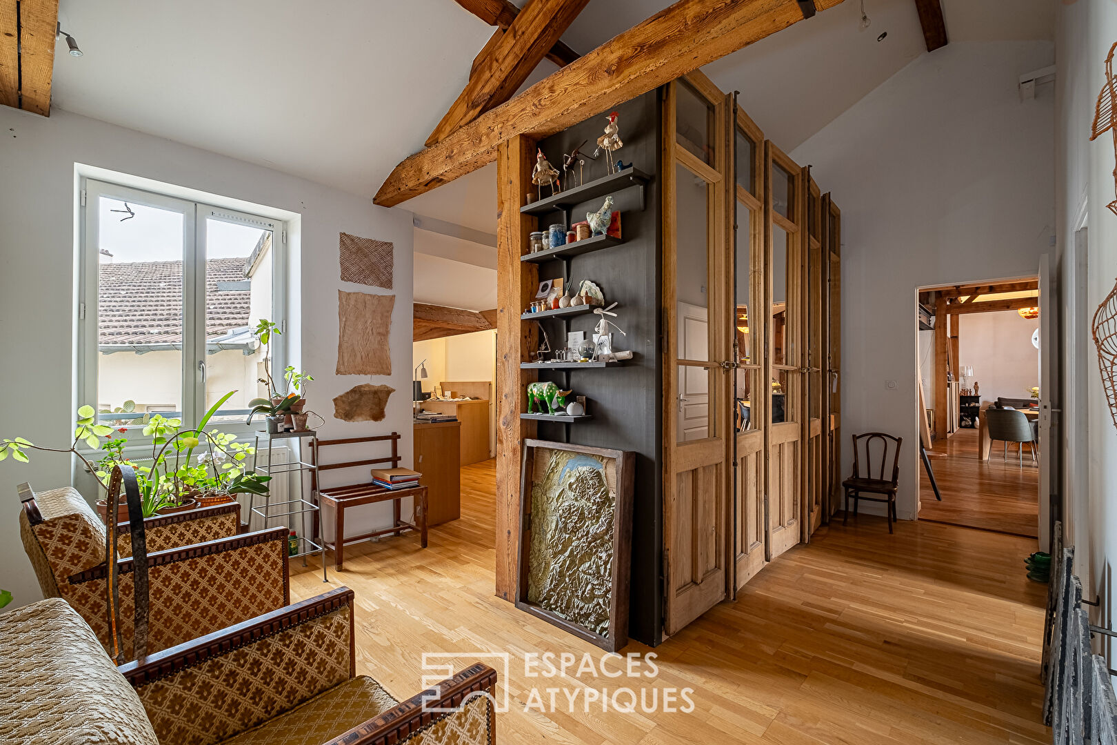 Appartement ancien rénové type loft en dernier étage