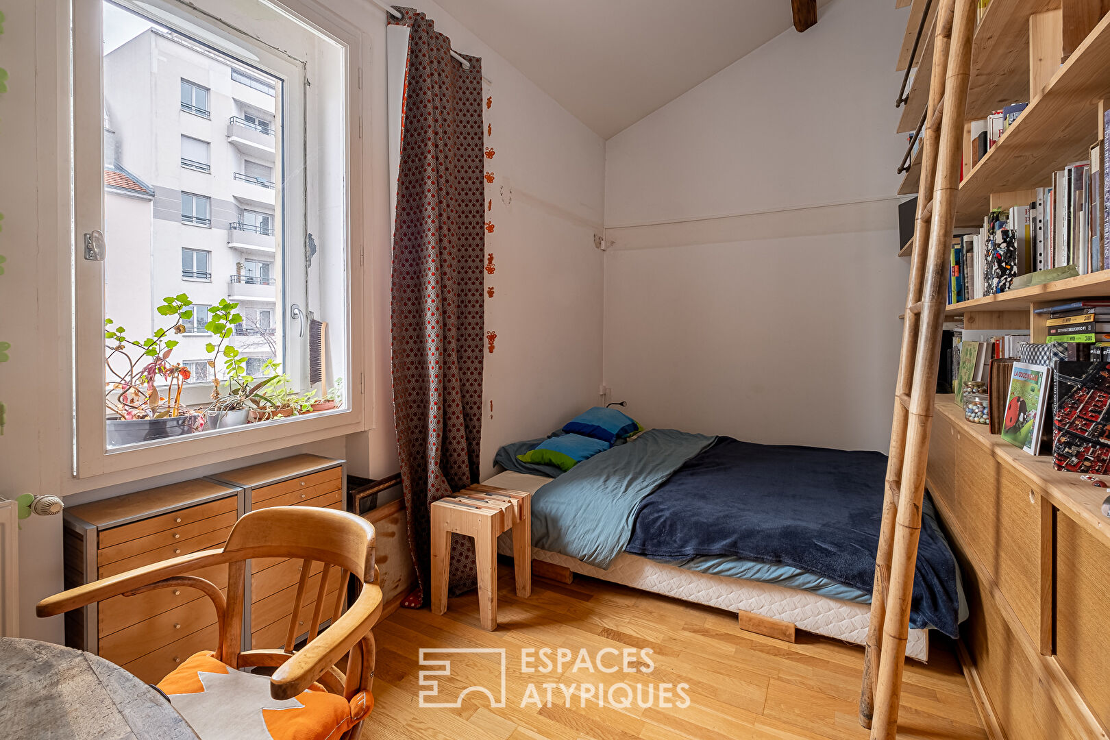 Appartement ancien rénové type loft en dernier étage