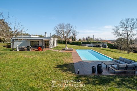 Maison d’architecte avec vue dans un environnement bucolique