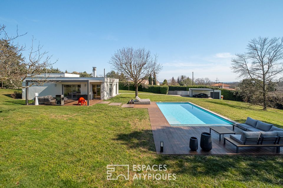 Maison d'architecte avec vue dans un environnement bucolique