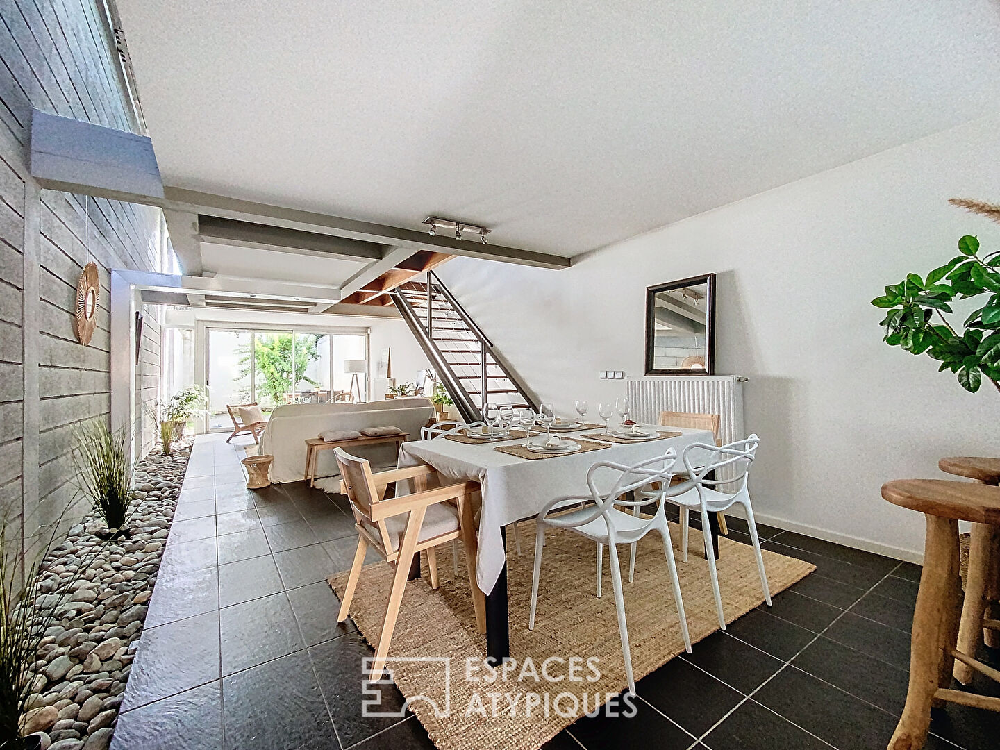 Loft industriel avec terrasse végétalisée