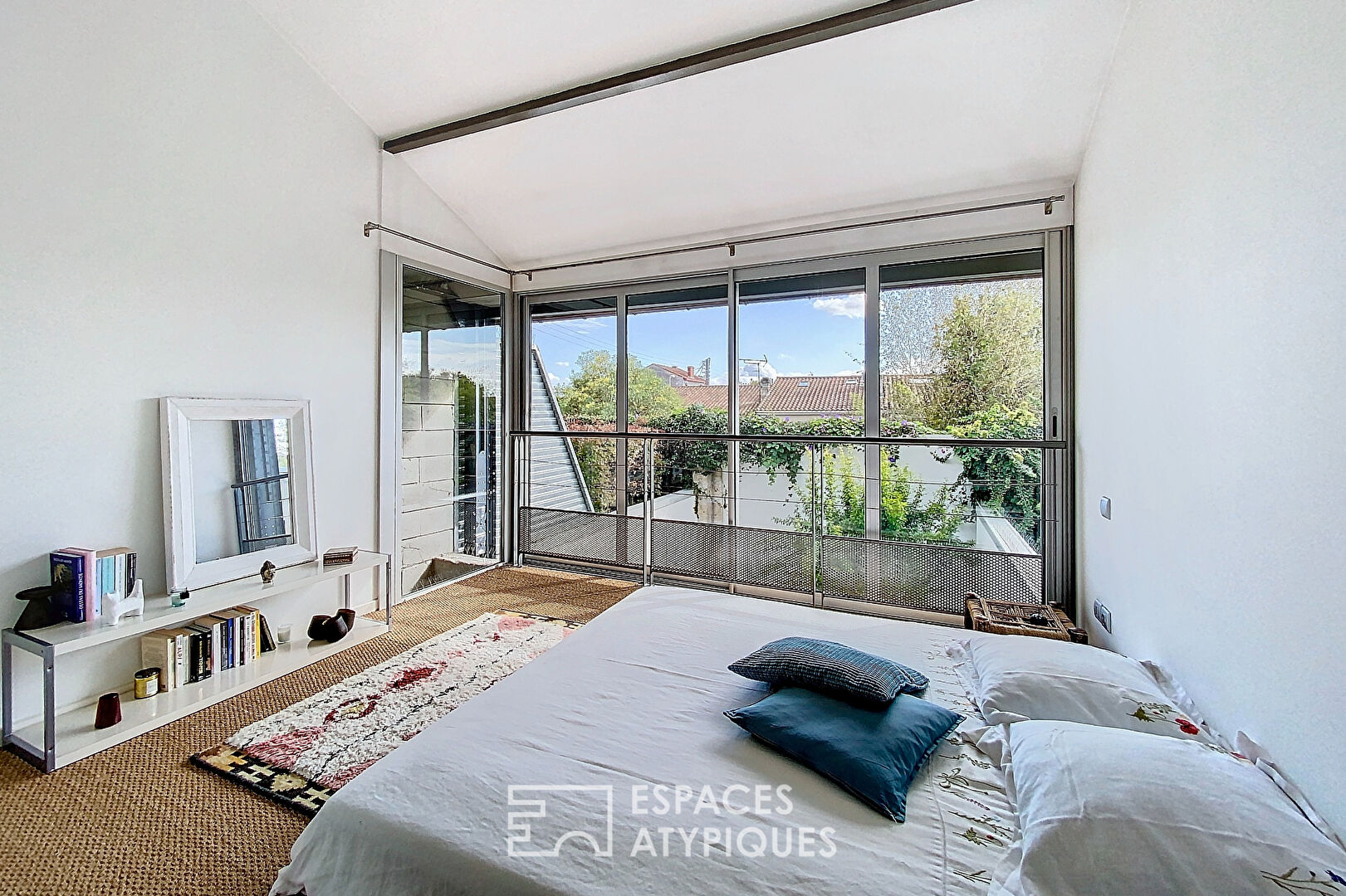 Loft industriel avec terrasse végétalisée