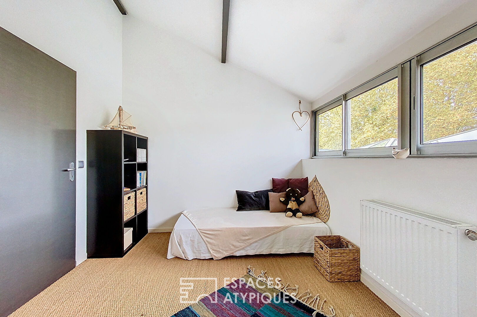 Loft industriel avec terrasse végétalisée