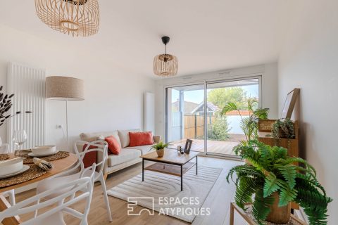 Appartement en rez-de-chaussée avec terrasse et jardin