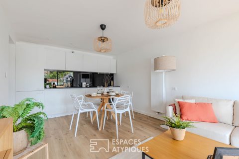 Appartement en rez-de-chaussée avec terrasse et jardin