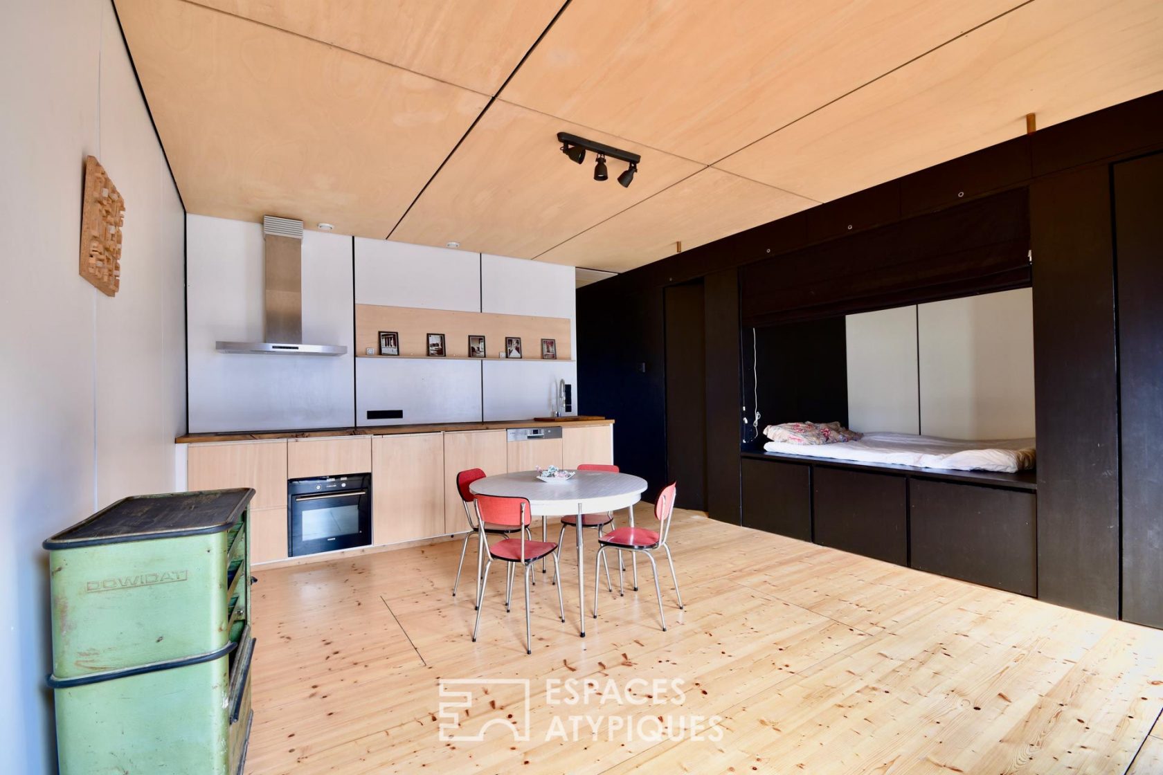 Cocoon apartment designed as a loft spirit