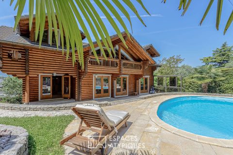 Finnish wooden house with swimming pool and landscaped garden