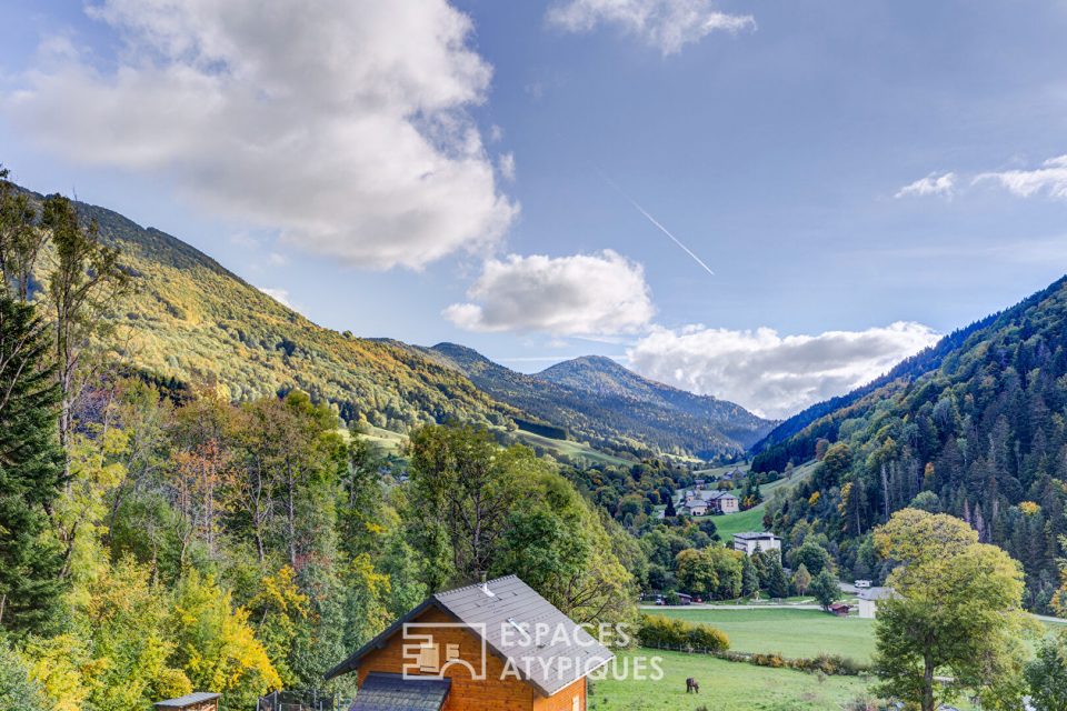 Chalet contemporain avec vue et espace bien être.