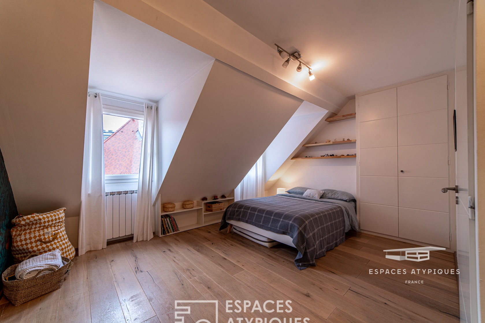 Triplex traversant contemporain en coeur de ville