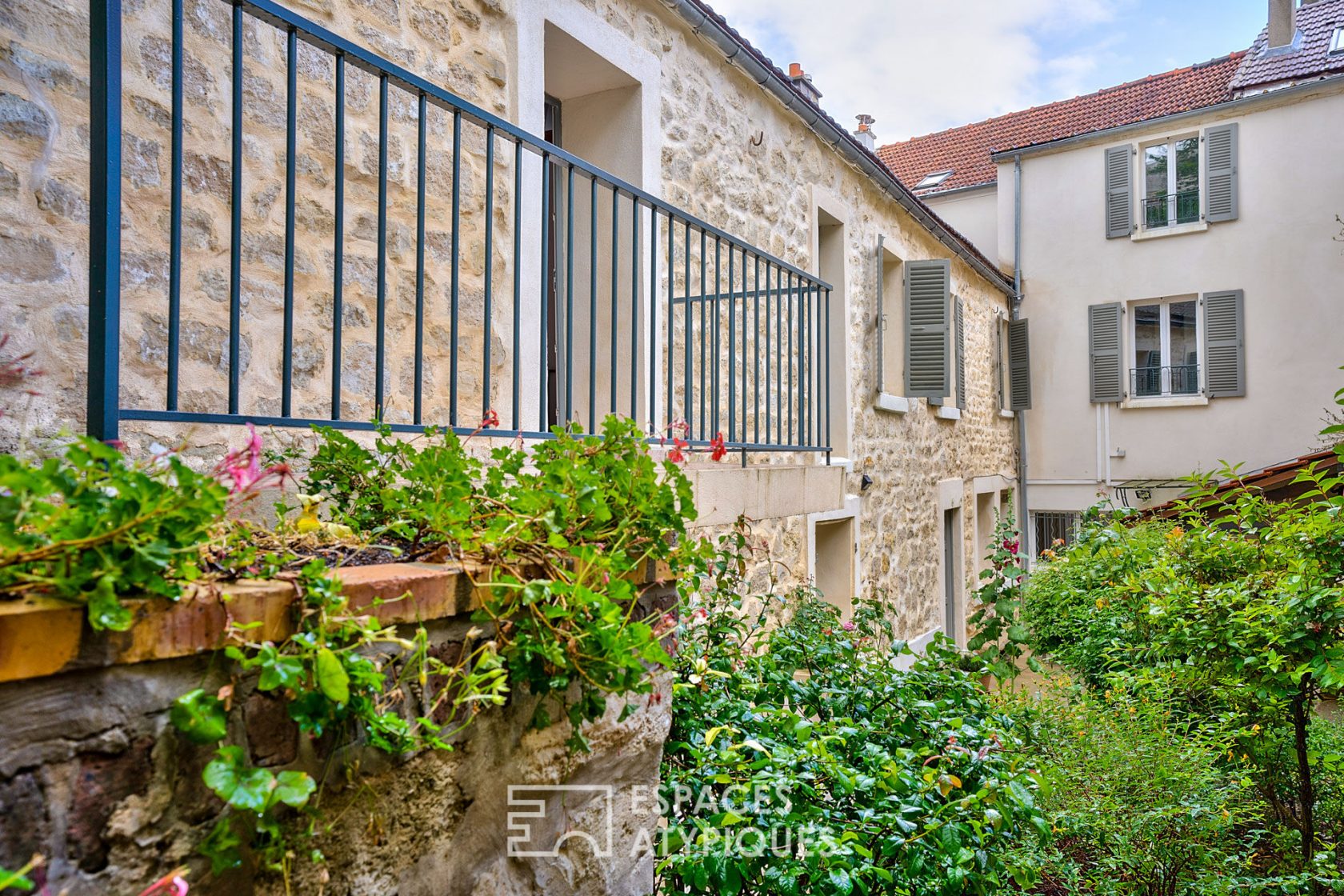 Townhouse with courtyard and hanging gardens St Wandrille