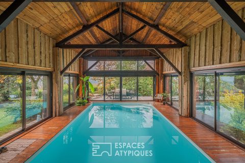 Old renovated barn with its indoor swimming pool