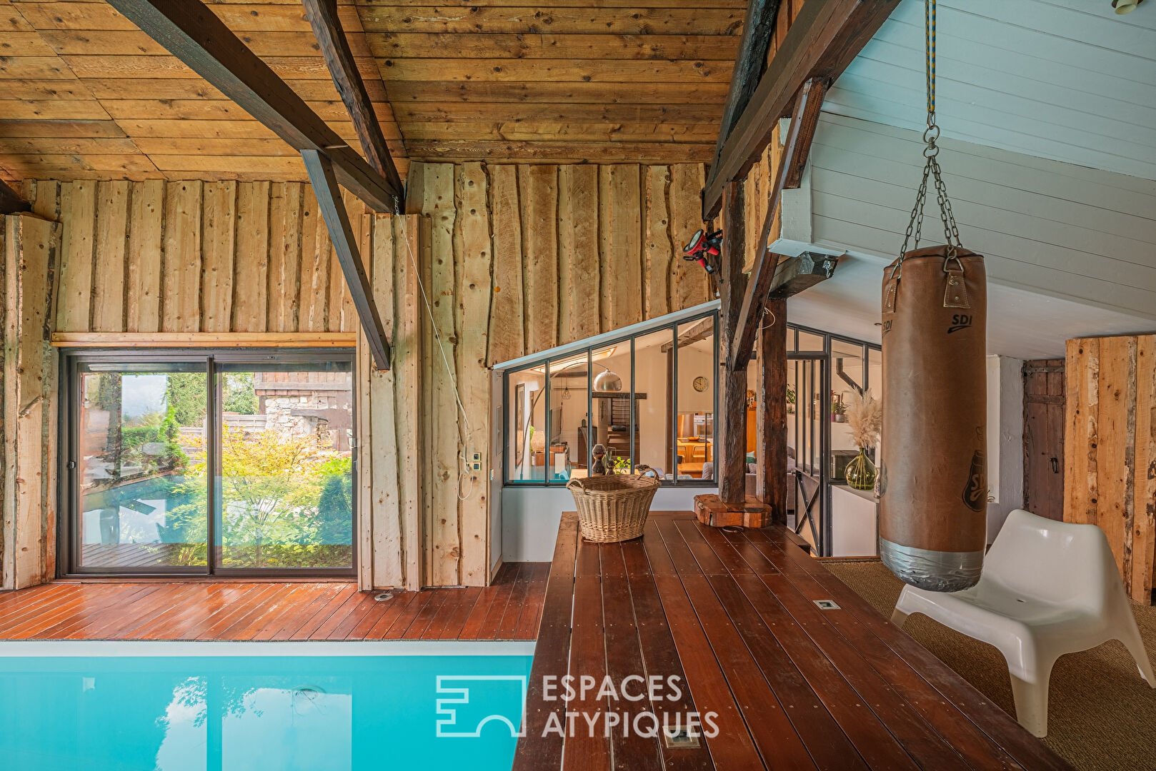 Old renovated barn with its indoor swimming pool