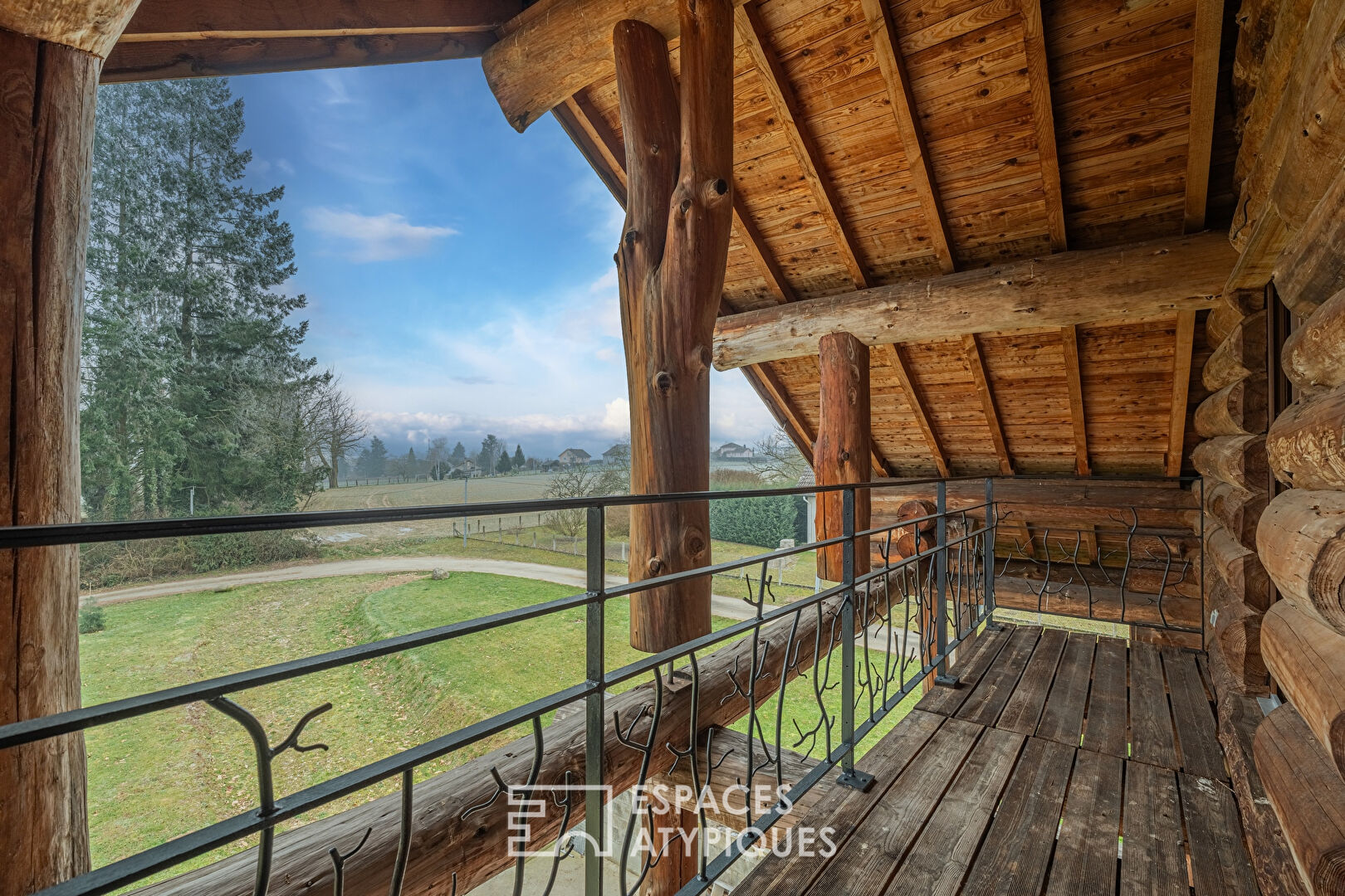 Real log cabin with view of the Pre-Alps