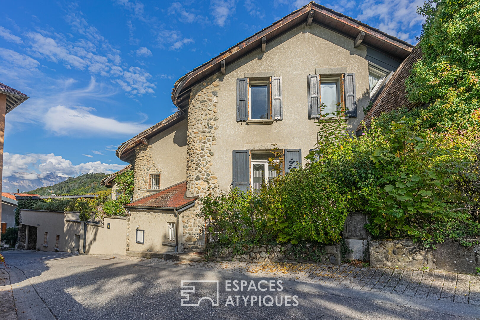 Village house with exposed stone