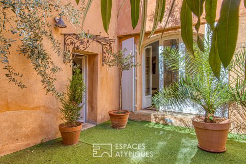 Atypical village house with patio and terrace