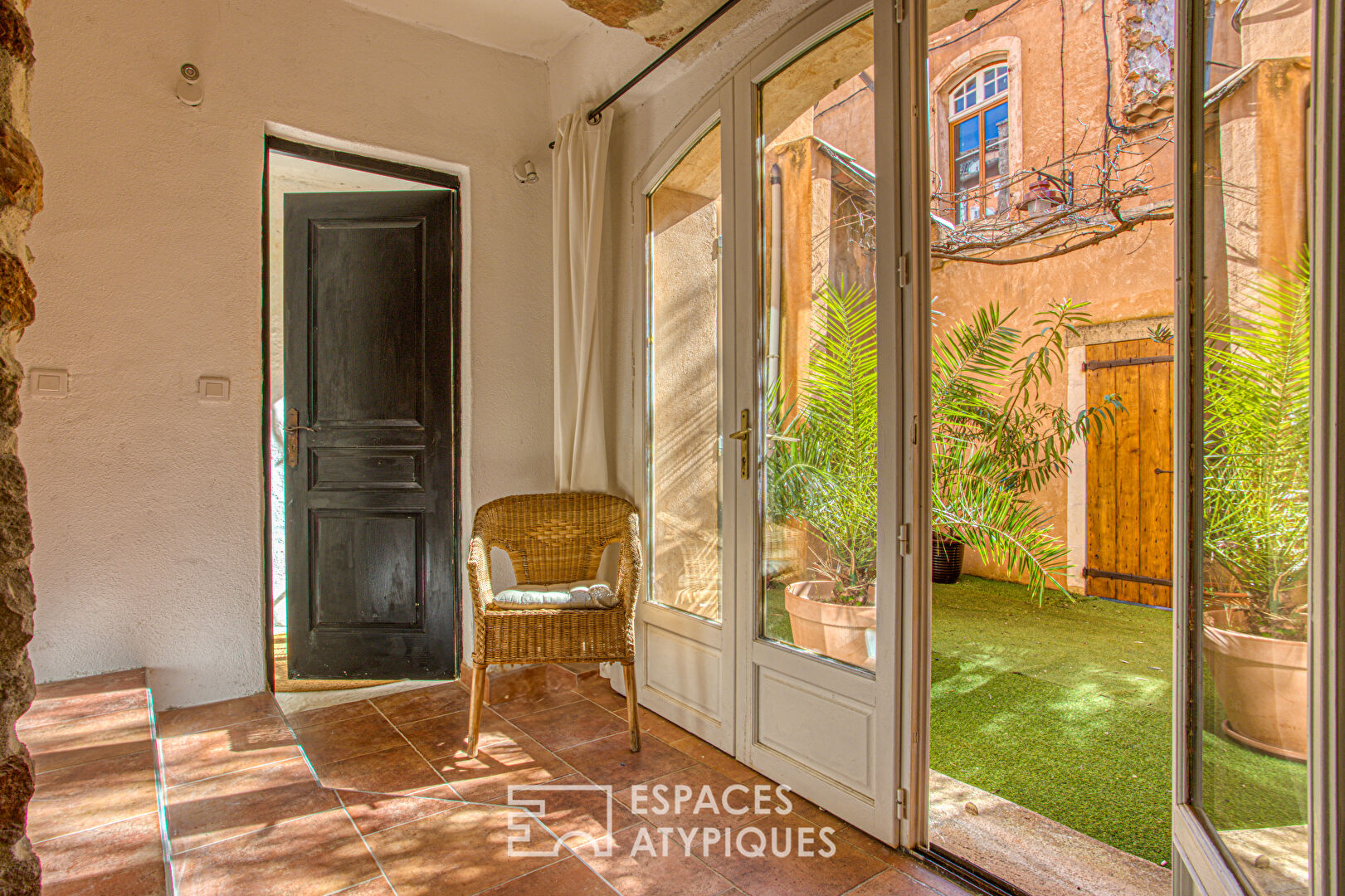 Atypical village house with patio and terrace