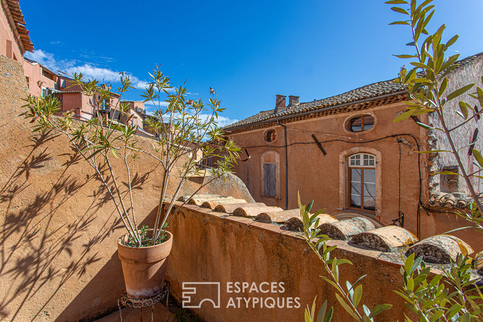 Atypical village house with patio and terrace