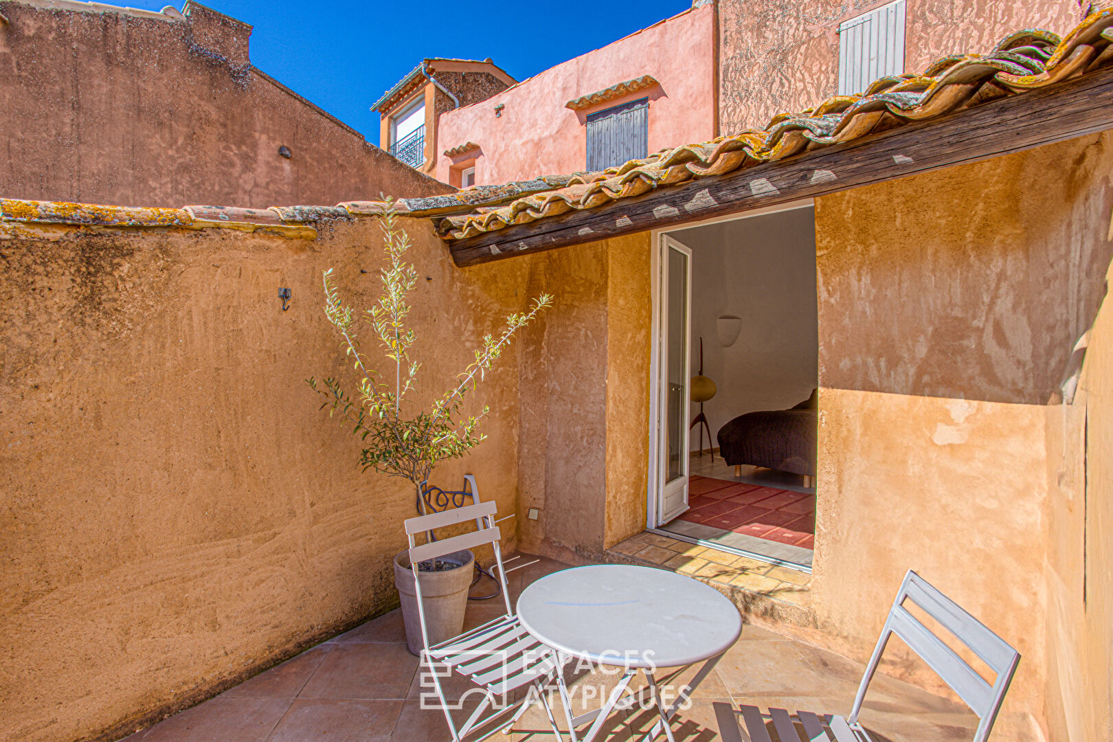 Atypical village house with patio and terrace