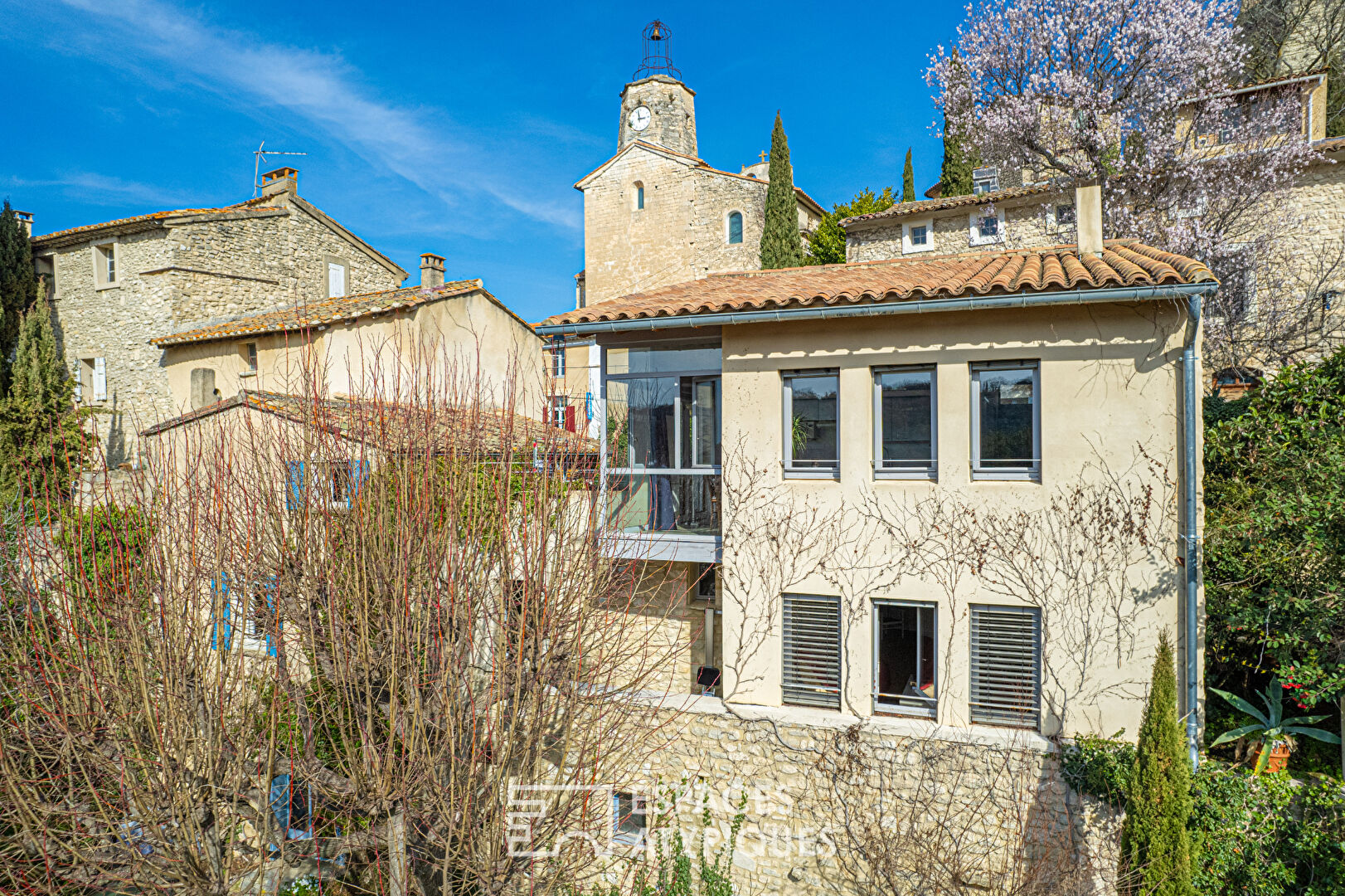 Old house and its contemporary extension with view.