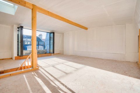 Loft en dernier étage à aménager