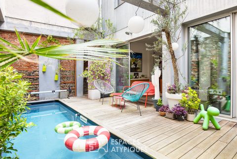 Workshop rehabilitated into a house with swimming pool in Toulouse