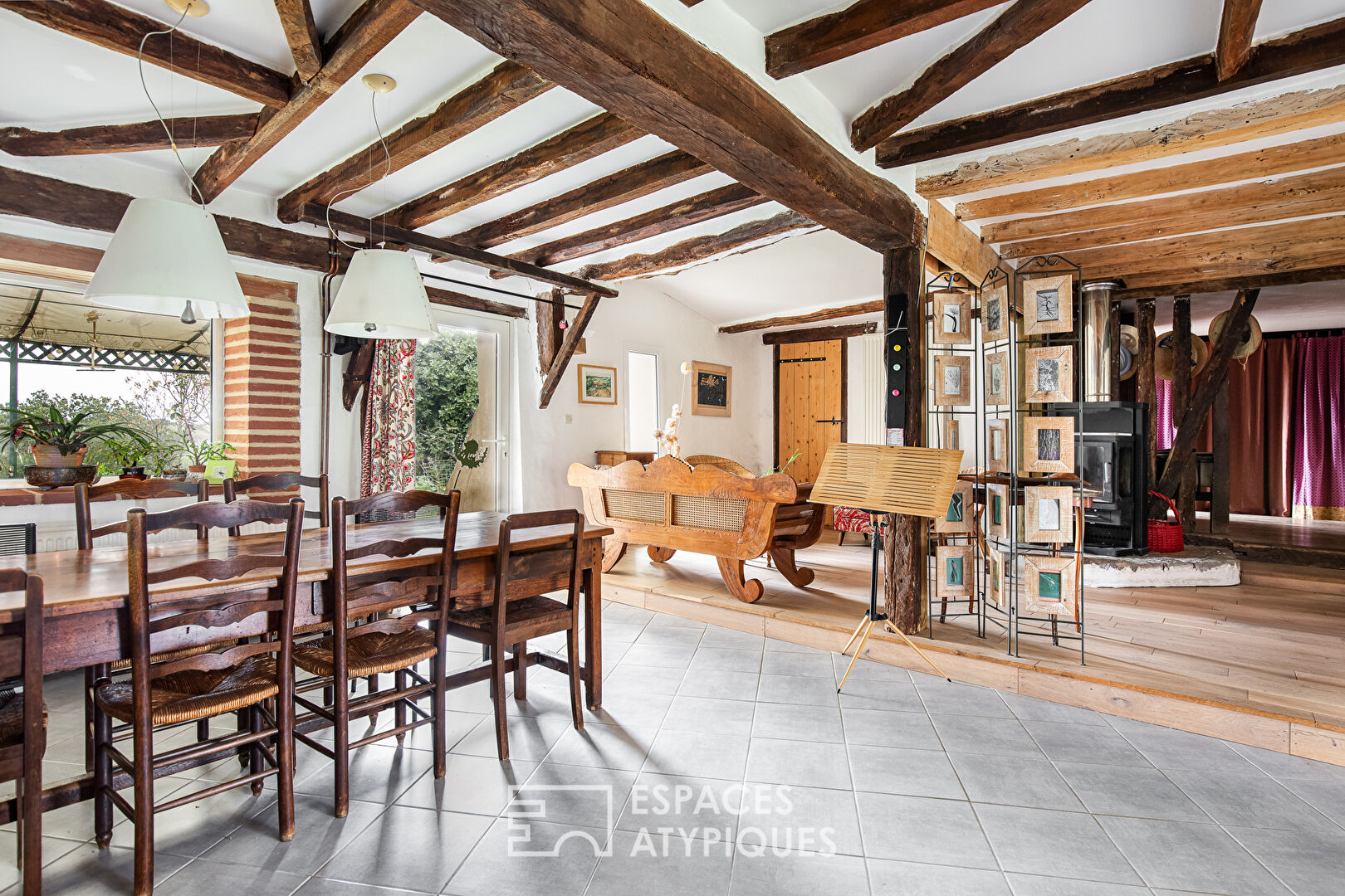 Old half-timbered farmhouse with swimming pool.