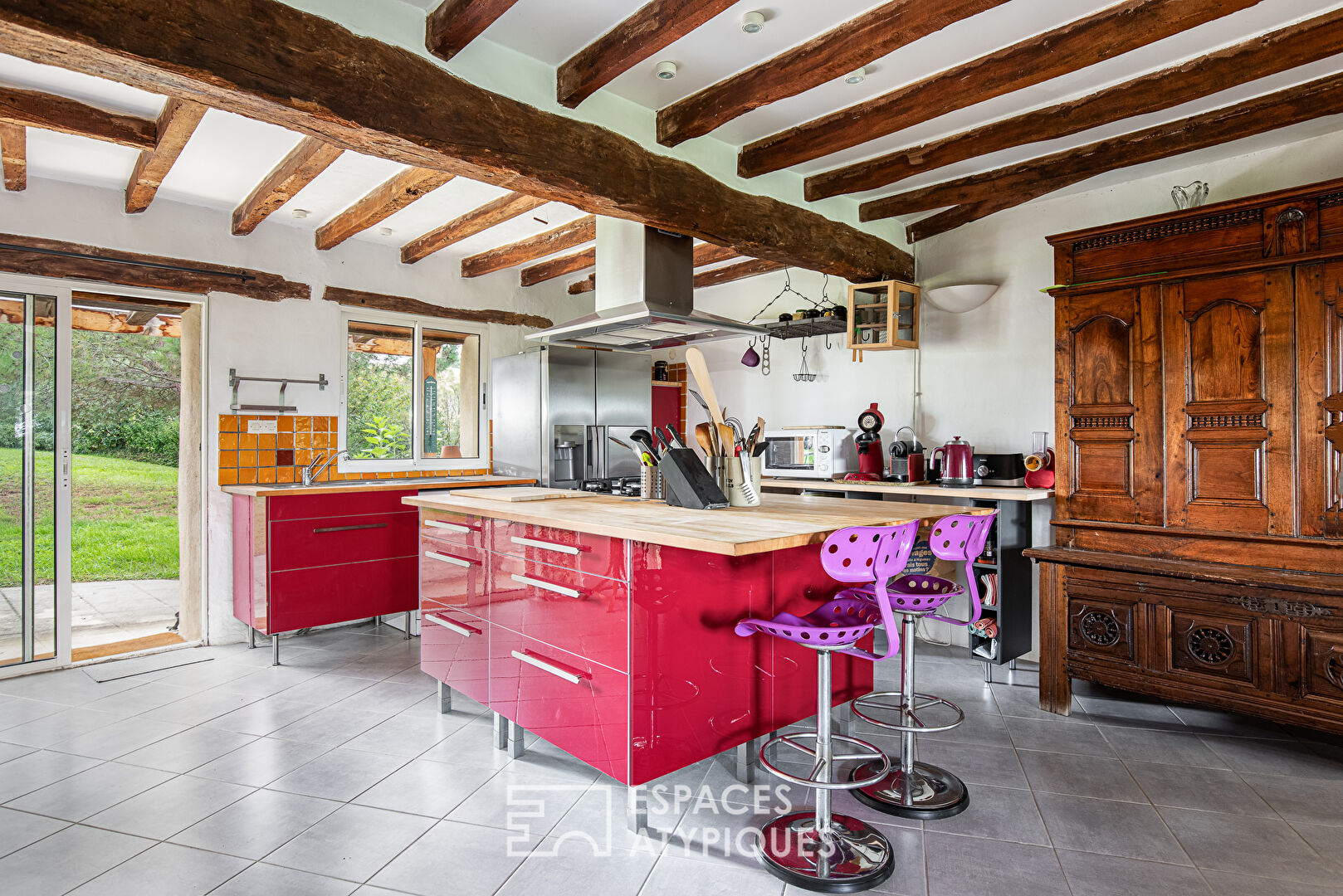 Old half-timbered farmhouse with swimming pool.