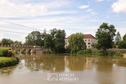 Old stone mill on the banks of the Seille