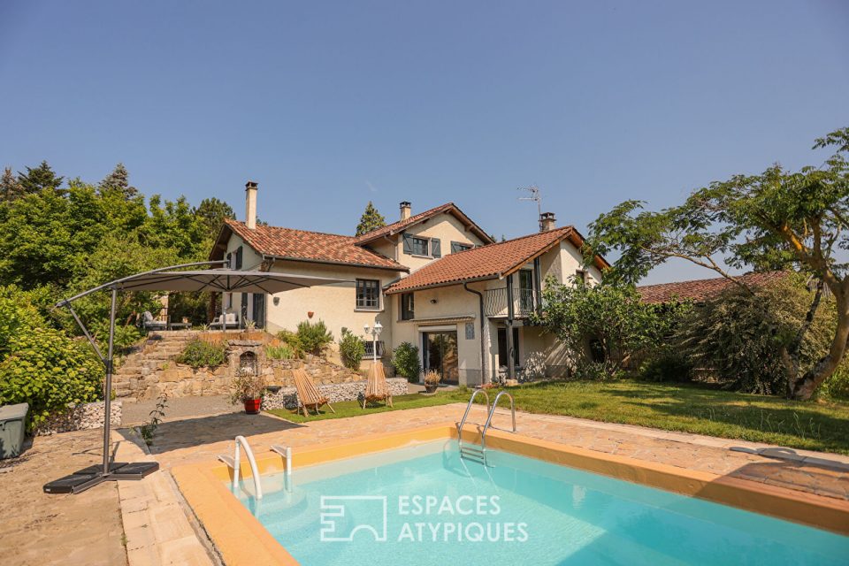 Maison familiale dans son écrin de verdure