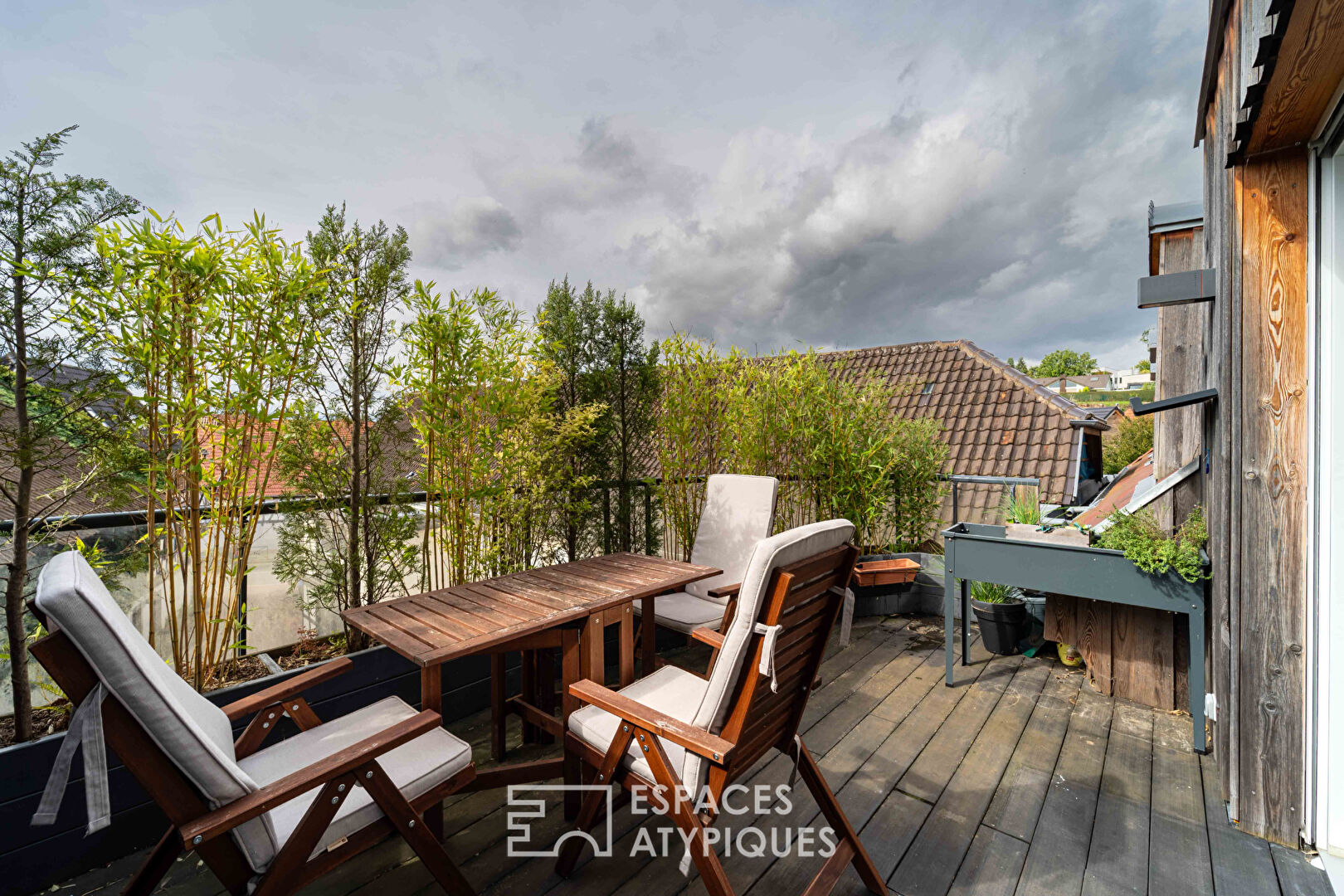 Duplex esprit loft et sa terrasse