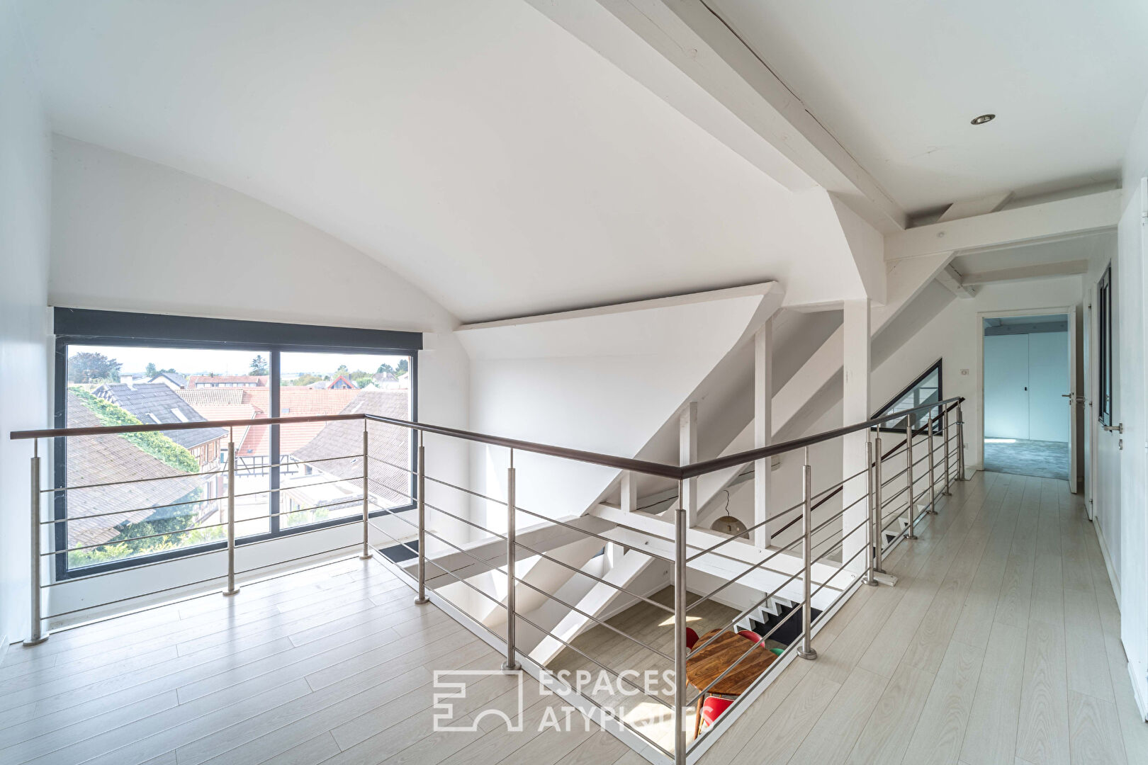 Duplex esprit loft et sa terrasse