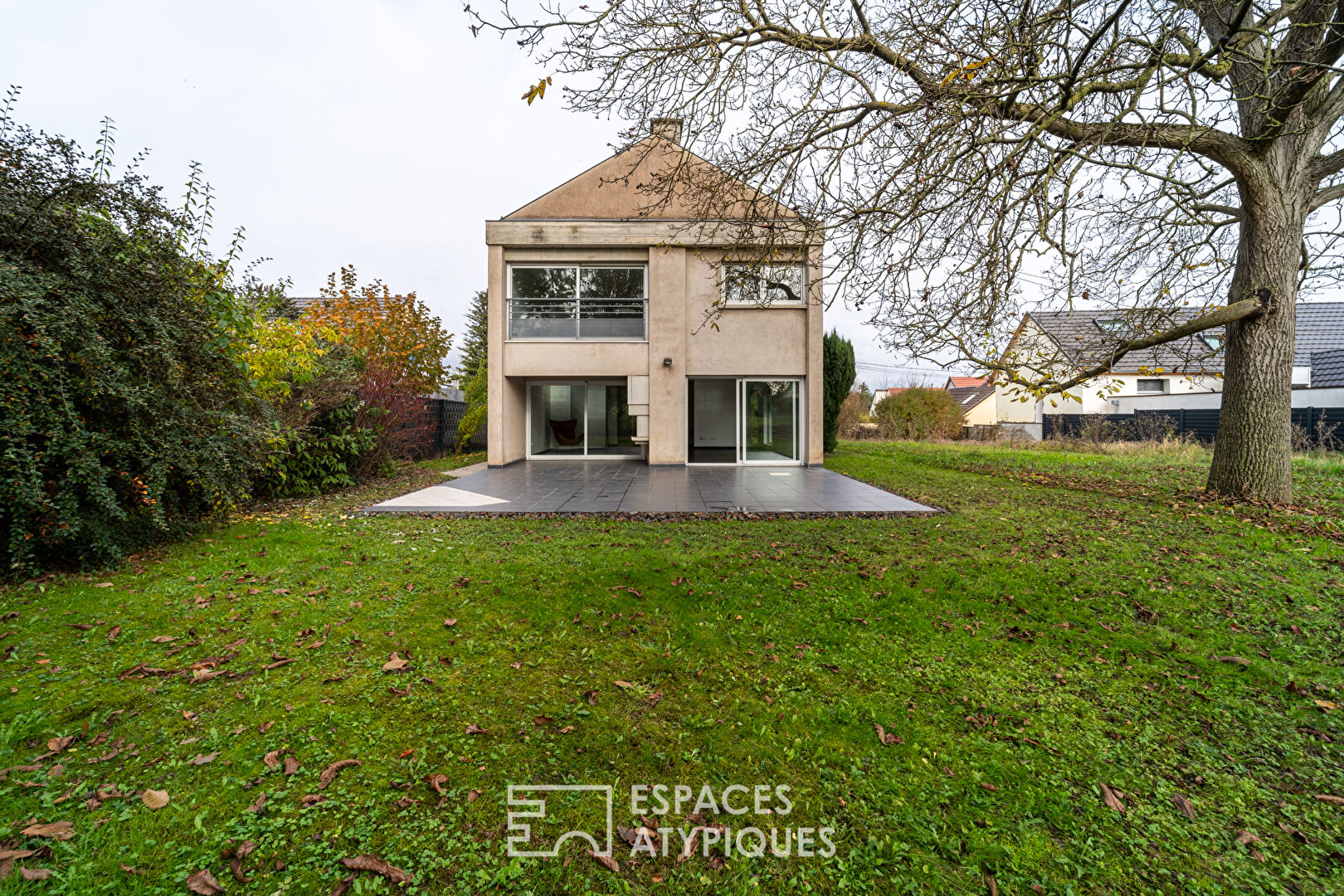 Brutalist-style architect-designed house with garden