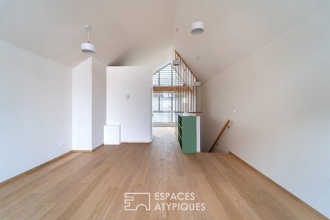 Top-floor loft and its terraces in the Coop district