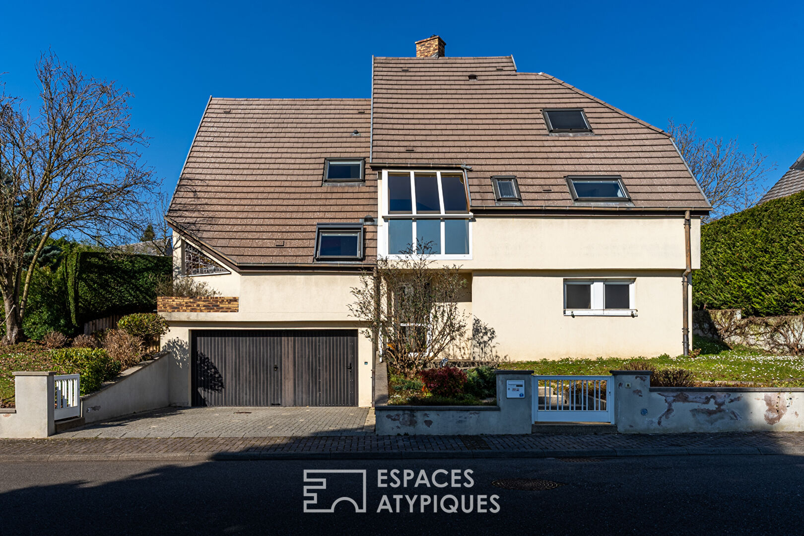 Architect-designed house with green garden