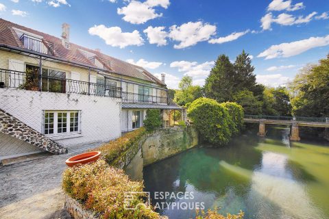 Ancien moulin du 17e siècle avec son pont et son île