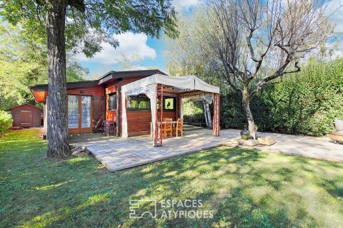 Maison en bois avec terrasse xxl et son jardin