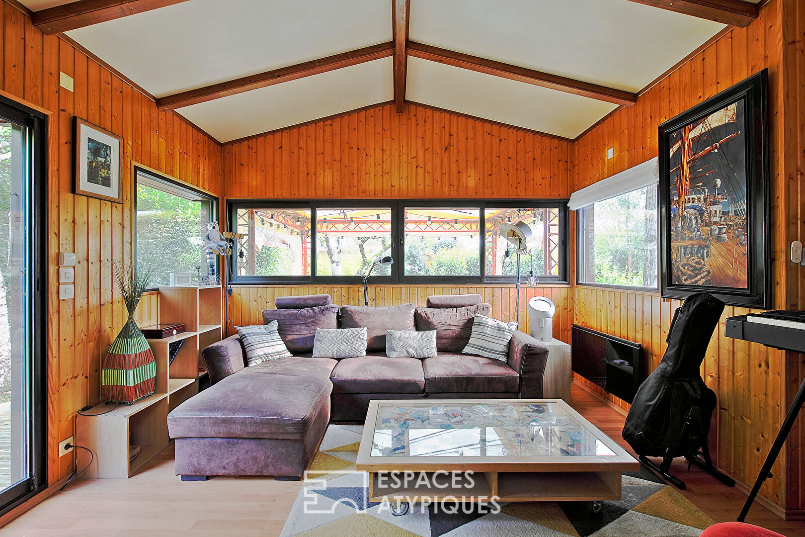 Maison en bois avec terrasse xxl et son jardin